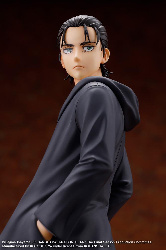 Angled close-up portrait shot of the Kotobukiya Eren Yeager figure displaying head sculpt details and coat hood