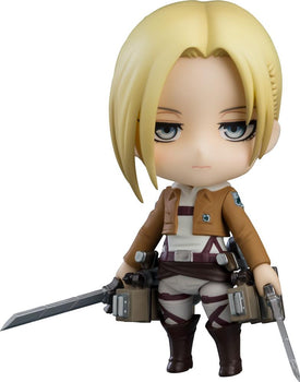 Jean Kirstein Nendoroid figure with goading smirk expression posed beside Eren Yeager Nendoroid figure.