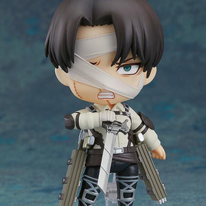 Nendoroid Levi Ackerman figure posed with one of his dual blades and the combat face plate, ready for battle.