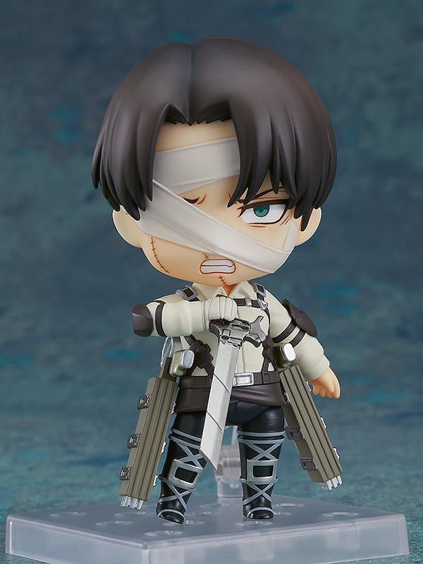 Nendoroid Levi Ackerman figure posed with one of his dual blades and the combat face plate, ready for battle.