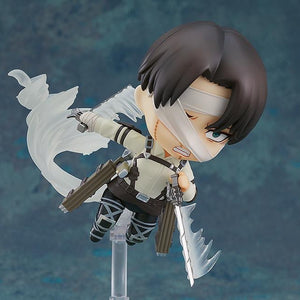 Nendoroid Levi figure displayed using the smoke effect parts to show him soaring through the air with his Vertical Maneuvering Equipment.