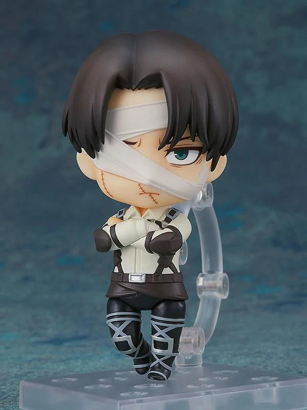 Attack on Titan Nendoroid Levi figure with the bandaged standard face plate, showing his signature Survey Corps uniform and harness.