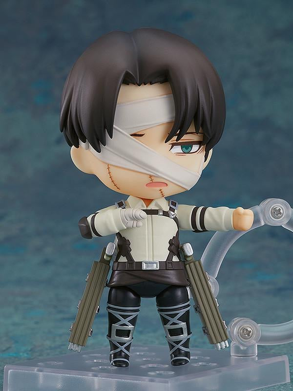 Front view of the Nendoroid Levi figure with the Vertical Maneuvering Equipment parts and dual blades attached.