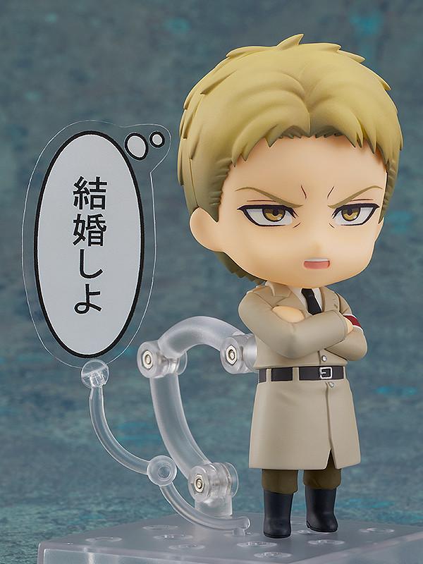 Reiner Braun Nendoroid figure in Marley coat with arms crossed on clear display stand.