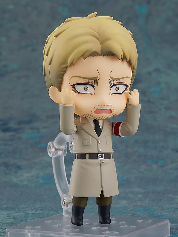 Reiner Braun Nendoroid figure holding rifle barrel near mouth with hopeless faceplate expression.