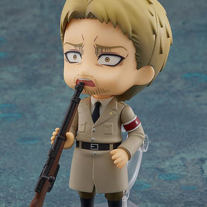 Attack on Titan Reiner Braun Nendoroid figure holding his rifle accessory in hand.