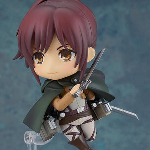 Sasha Braus Nendoroid figure standing on clear display stand with Survey Corps cloak and dual blades.