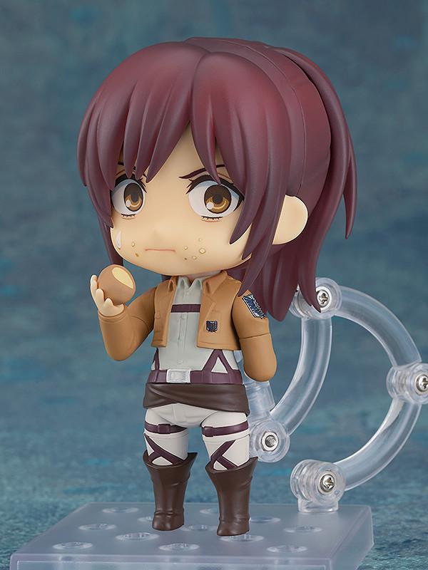 Sasha Braus Nendoroid figure performing Survey Corps salute in brown jacket uniform.