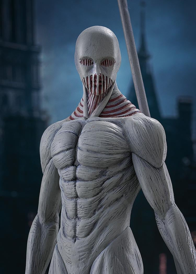 Close-up on the War Hammer Titan figure's upper body, detailing the unique mask-like face, red sinew around the neck, and muscular sculpt.