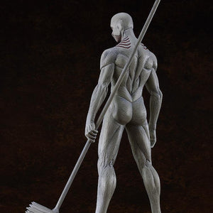 Studio shot of the War Hammer Titan figure's back, emphasizing the highly detailed sculpt of the back muscles and the texture of the pale Titan body.