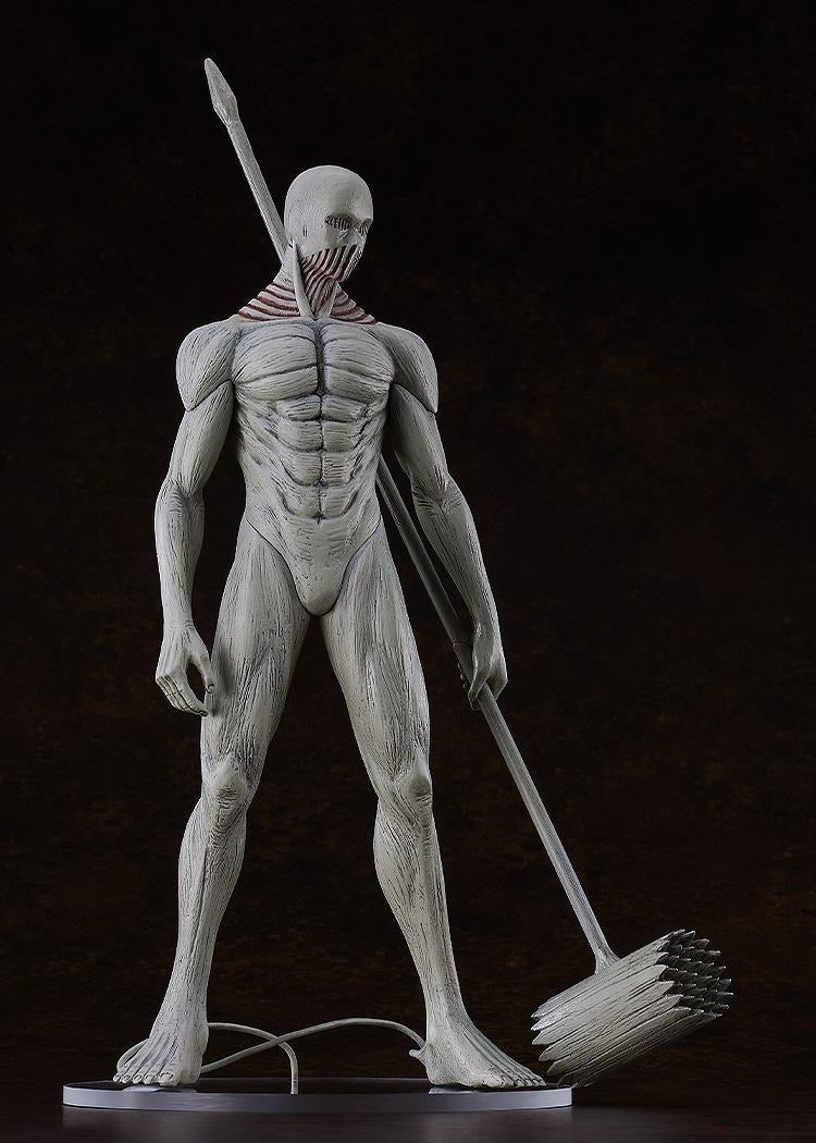 Studio shot of the War Hammer Titan figure, showing the full front pose, the skeletal/muscular body, and the detail of the large hammer weapon.