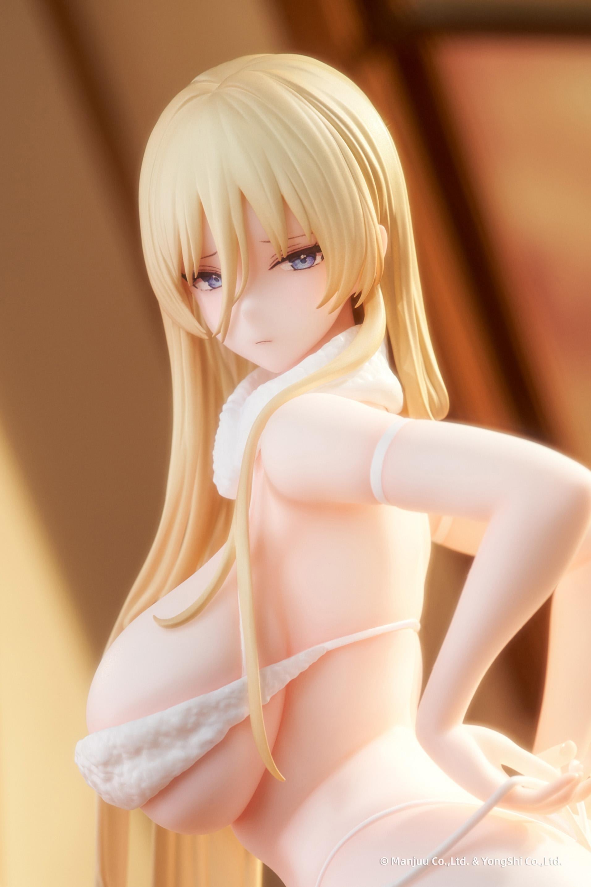 Close-up high-angle shot of the Bismarck Unpacked Surprise figure's face and detailed blonde hair.