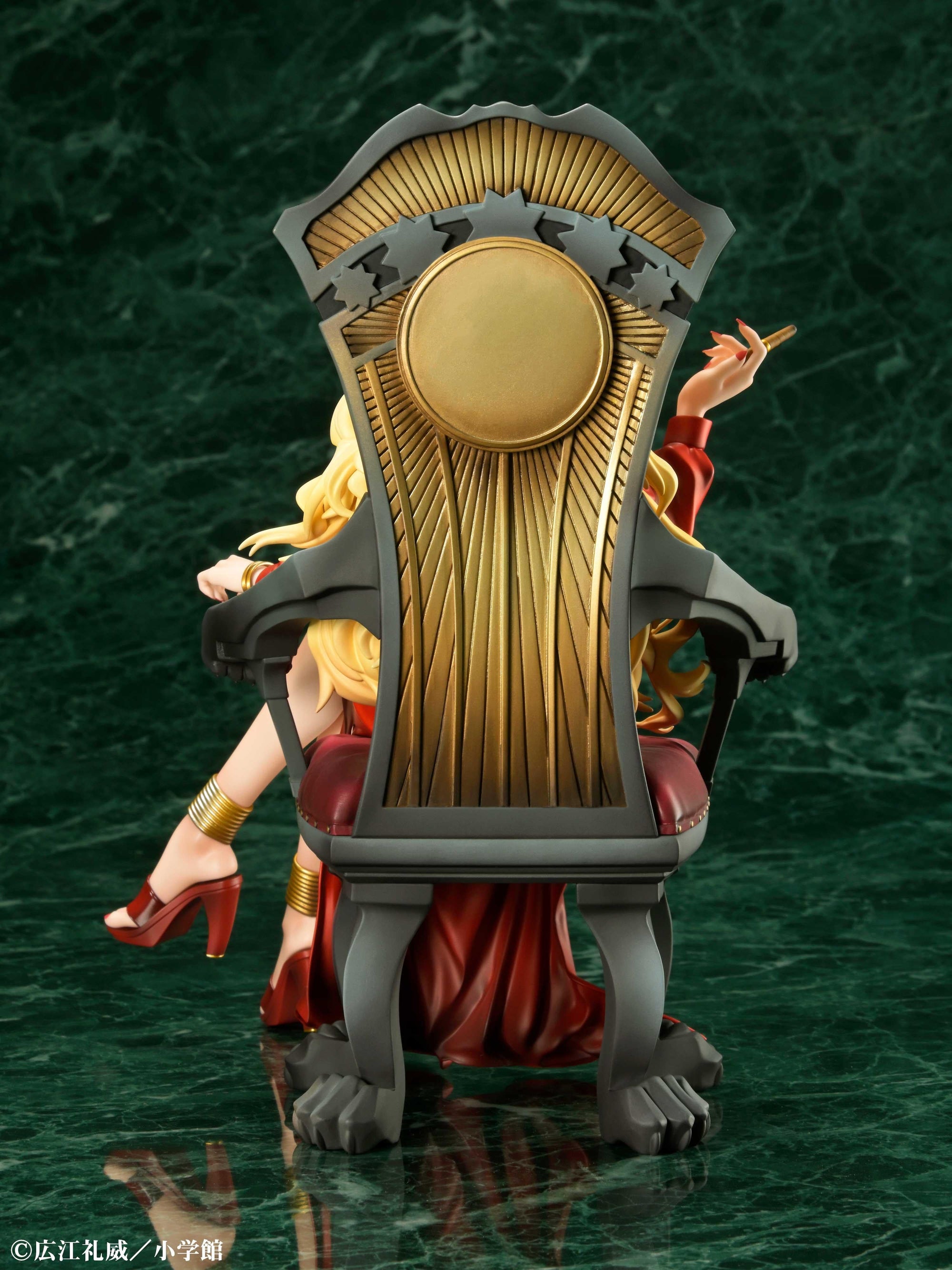 Rear view of the Balalaika figure's throne, highlighting the intricate gold sunburst and star patterns.