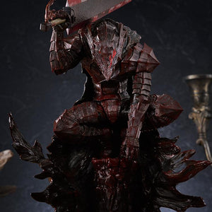 Front view of Berserk Guts crouching in Berserker Armor with blood-soaked Dragon Slayer sword aloft
