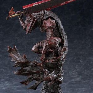 Side view of Pop Up Parade L Guts in Berserker Armor bloody paint version figure crouching on rock base