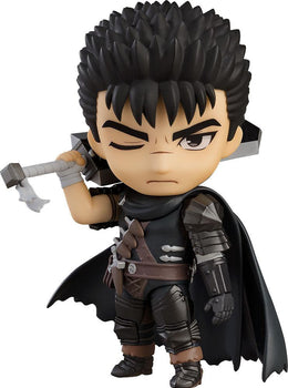 Male anime character Nendoroid figure with light green hair, eyepatch, and pistol posed in a mossy stone diorama