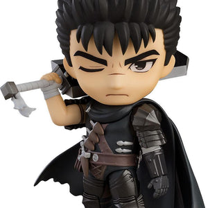 Male anime character Nendoroid figure with light green hair, eyepatch, and pistol posed in a mossy stone diorama