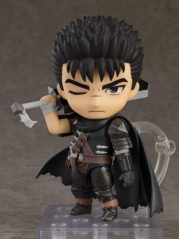 Cutout view of the Good Smile Company Berserk Guts Nendoroid figure with serious expression and Dragon Slayer sword resting over his shoulder