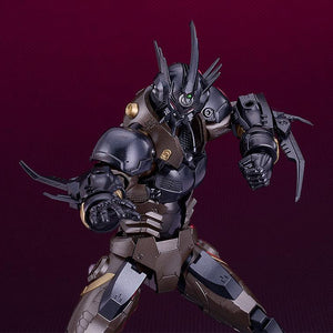Close-up of the Guyver 03 torso and head, showcasing the green sensory orb and layered chest plating.