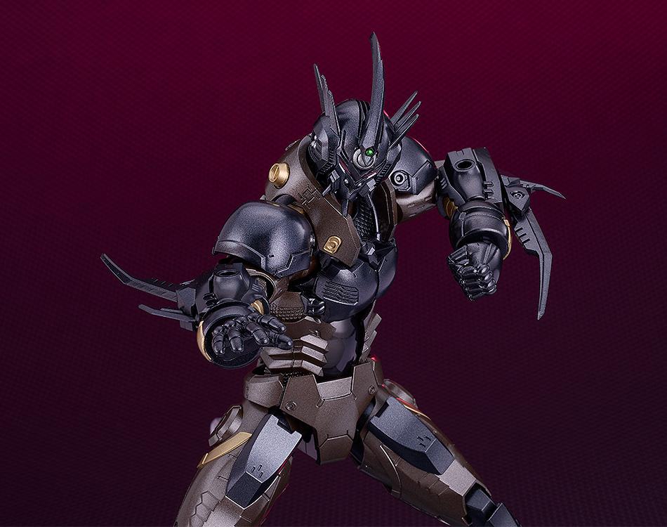 Close-up of the Guyver 03 torso and head, showcasing the green sensory orb and layered chest plating.