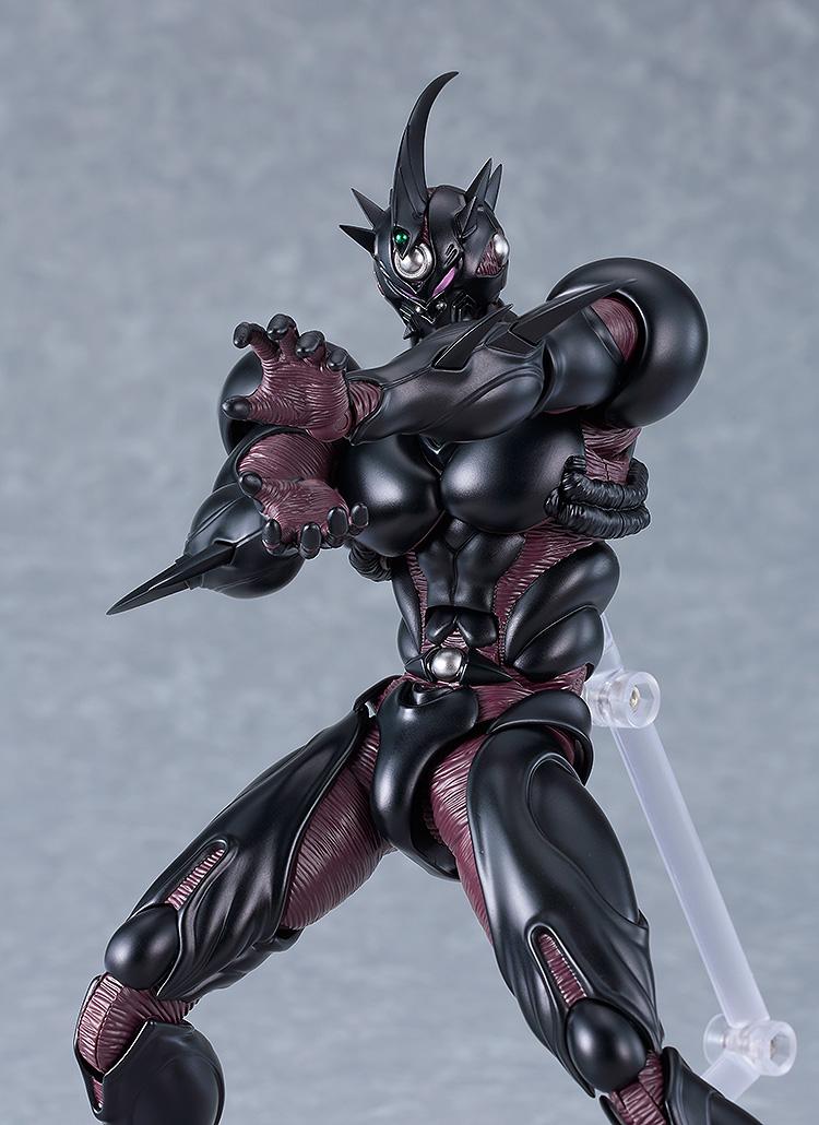 Low-angle combat stance of figma Guyver III action figure with open reaching hands.