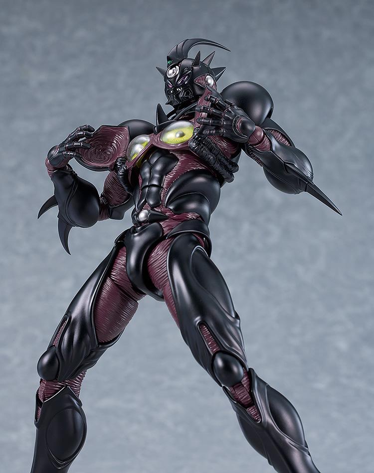 Close-up shot of figma Guyver III opening chest armor plates to reveal yellow Mega-Smasher organic lenses.