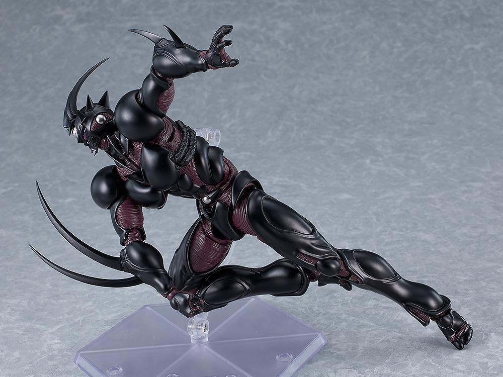Dynamic low-crouch attack pose of figma Guyver III wielding extended High Frequency Wave-Vibration Blades.