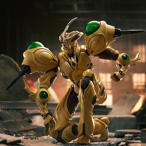 The highly articulated Guyver Gigantic figma figure striking a kneeling pose in a ruined city environment.