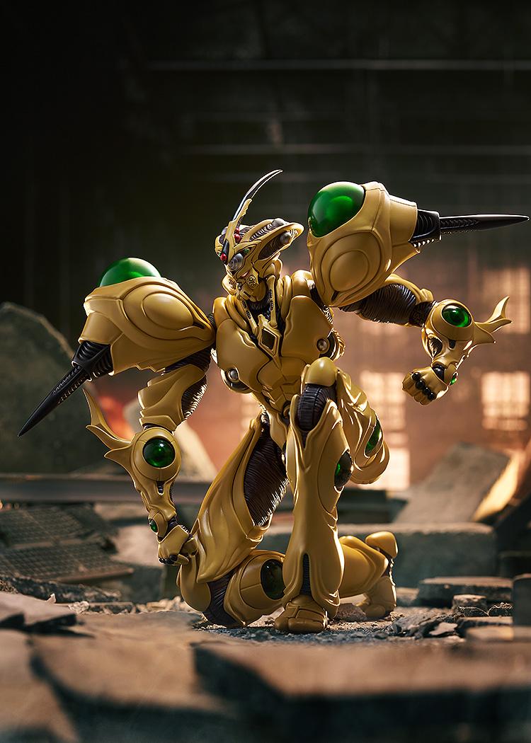 The highly articulated Guyver Gigantic figma figure striking a kneeling pose in a ruined city environment.