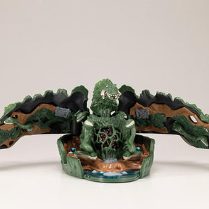 Unfolded Biollante pocket playset wide view showing central plant core and fold-out landscape panels.