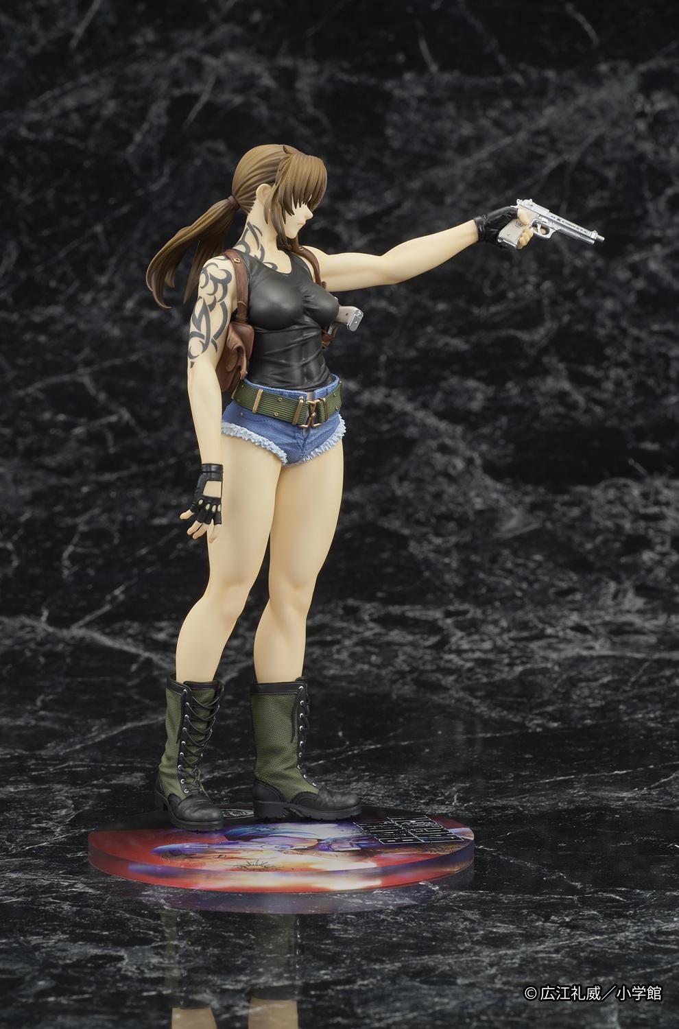Right profile view of the Black Lagoon Revy statue showcasing the detailed tribal tattoo on her upper arm, leather shoulder holster, and combat boots.