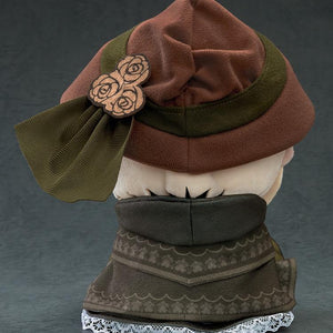 Rear view of The Doll plushie from Bloodborne, highlighting the green ribbon, rose accents on the bonnet, and lace trim on the capelet.