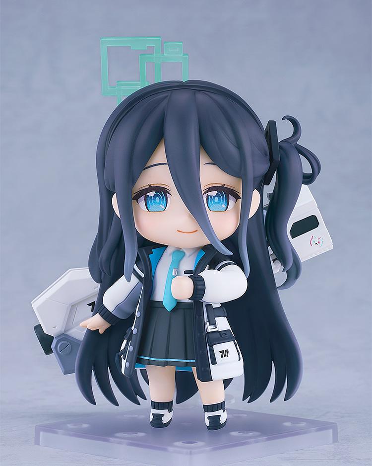 Full-body view of the Aris Tendou Nendoroid figure standing on a clear plastic display base with a gentle smiling face plate.