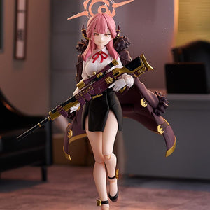 Promotional lifestyle shot of the Aru Rikuhachima figma standing in a realistic office environment.