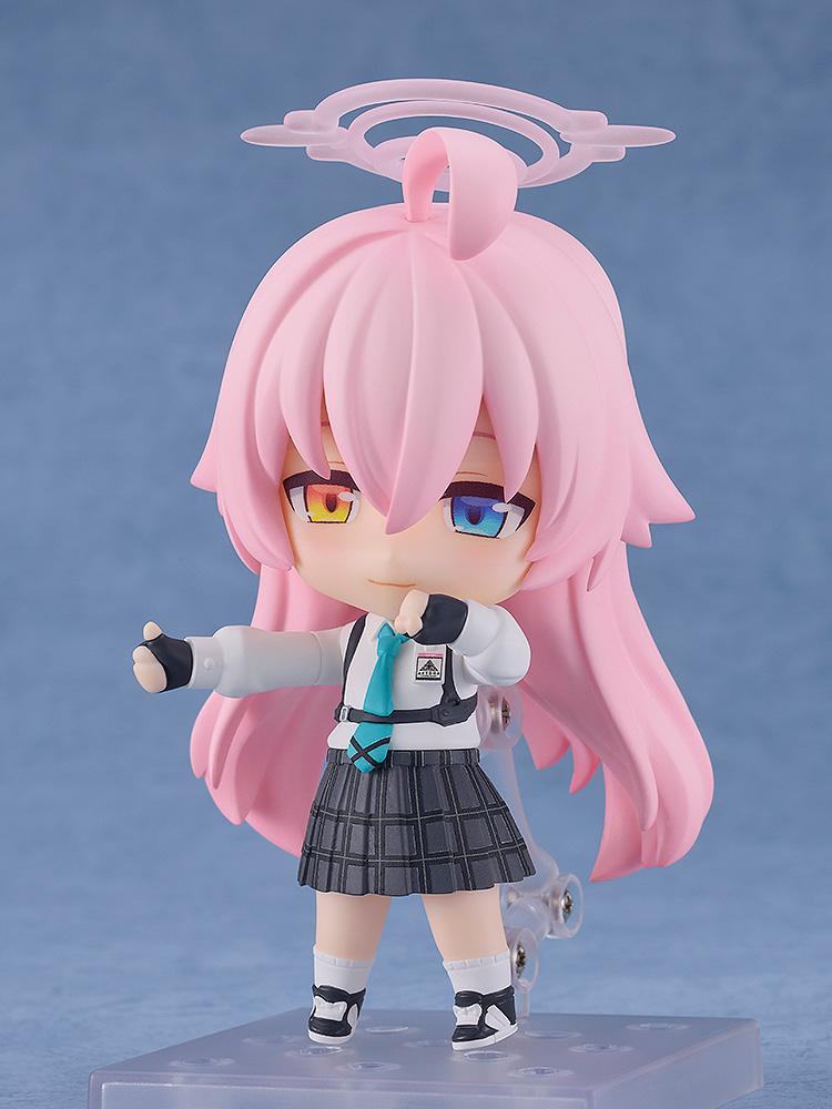 Articulated Hoshino Takanashi Nendoroid figure in a dynamic pose with her heterochromatic yellow and blue eyes visible.