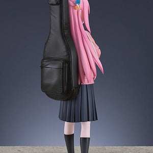 Rear view of the Hitori Gotoh figure highlighting the realistic leather texture of the black guitar case.