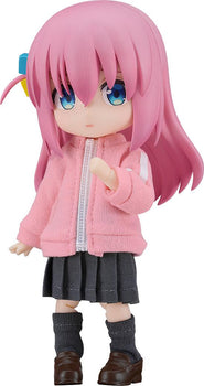Nendoroid Doll Hitori Gotoh action figure from Bocchi the Rock! featuring her signature pink hair, blue hair clip, fabric pink tracksuit jacket, and grey pleated skirt.