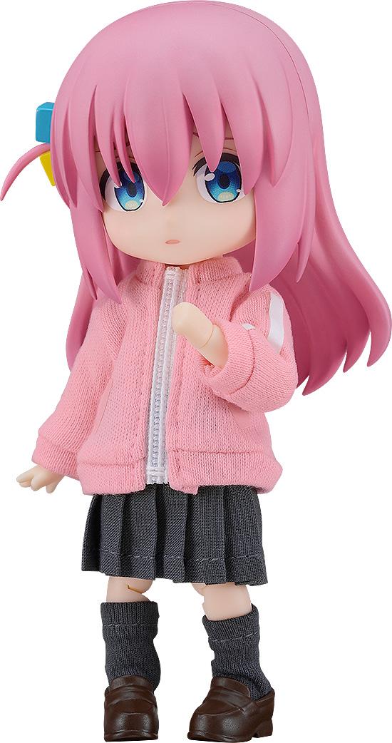 Nendoroid Doll Hitori Gotoh action figure from Bocchi the Rock! featuring her signature pink hair, blue hair clip, fabric pink tracksuit jacket, and grey pleated skirt.