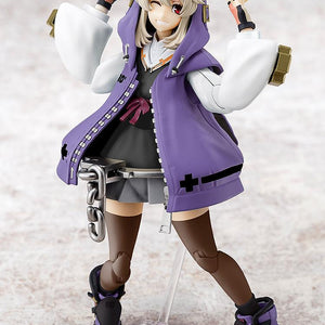 Close-up of Bridget featuring a smiling face plate and signature purple nun-inspired headpiece from the Guilty Gear -Strive- model line.
