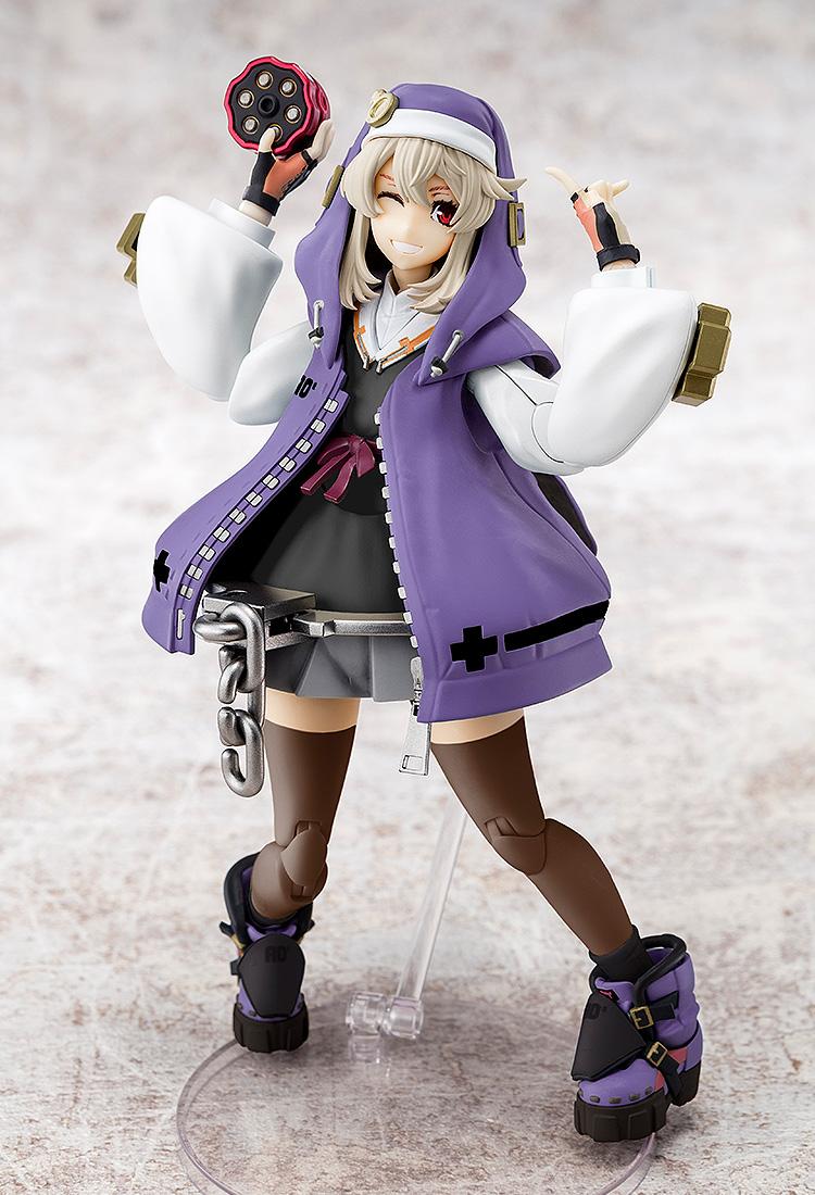 Close-up of Bridget featuring a smiling face plate and signature purple nun-inspired headpiece from the Guilty Gear -Strive- model line.