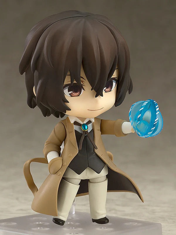 Nendoroid Osamu Dazai figure with the standard expression, holding the translucent blue effect part representing his ability, "No Longer Human."