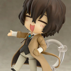 Nendoroid Osamu Dazai figure with the carefree expression face plate, posed with one arm outstretched and eyes closed in laughter.