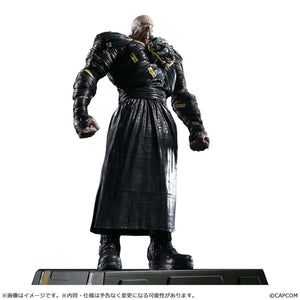 A low-angle studio shot of the 18-inch Nemesis figure by Capcom, emphasizing the imposing monster's height and detailed muscular sculpt.