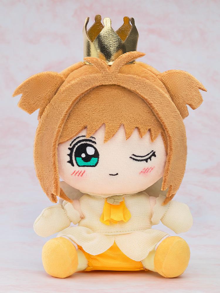 Front view product studio shot of the Sakura Kinomoto Tobira wo Akete version plushie with a winking expression against a soft pink background.