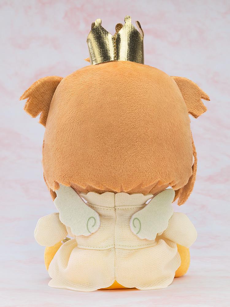 Rear view of the Cardcaptor Sakura Kinomoto anime plushie showing her brown hair, gold crown, and small light green wings attached to her dress.