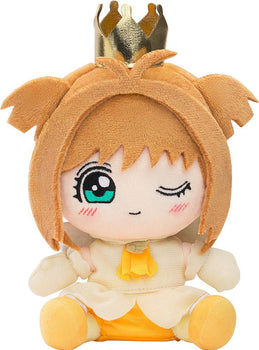 Chibi plush toy of Sakura Kinomoto from Cardcaptor Sakura in her Tobira wo Akete opening theme outfit with a gold crown on a white background.