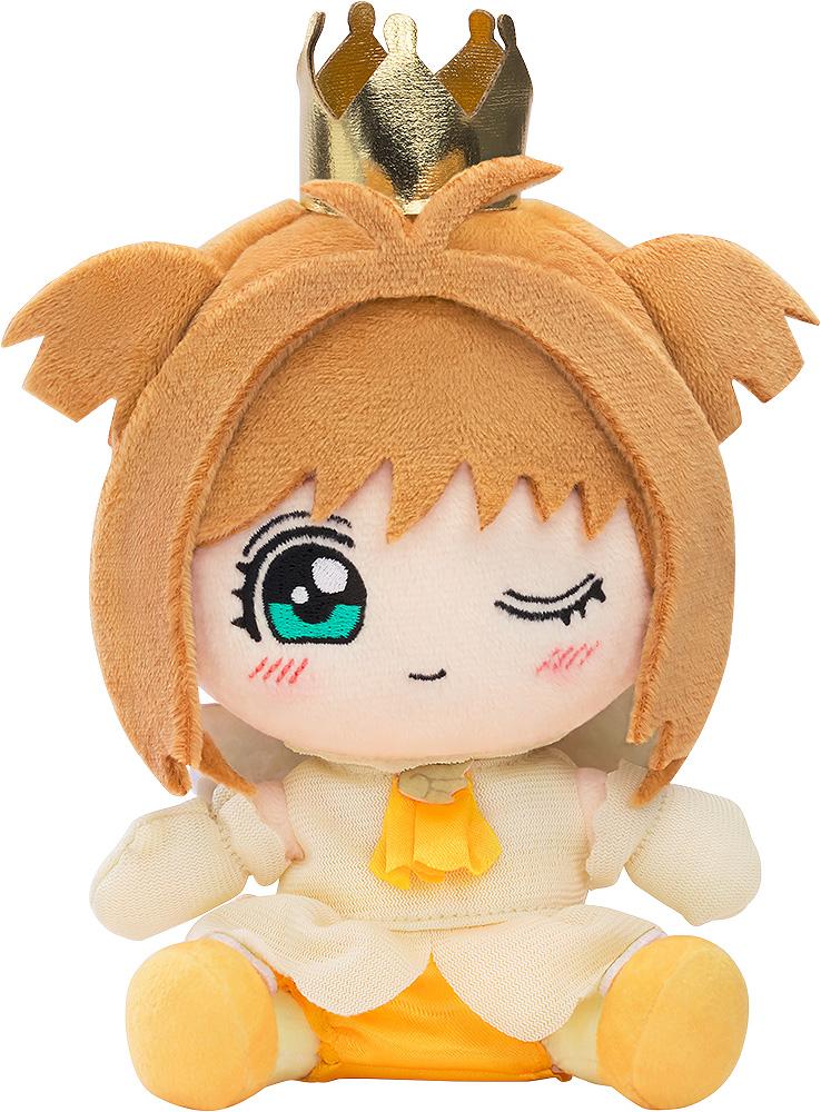 Chibi plush toy of Sakura Kinomoto from Cardcaptor Sakura in her Tobira wo Akete opening theme outfit with a gold crown on a white background.