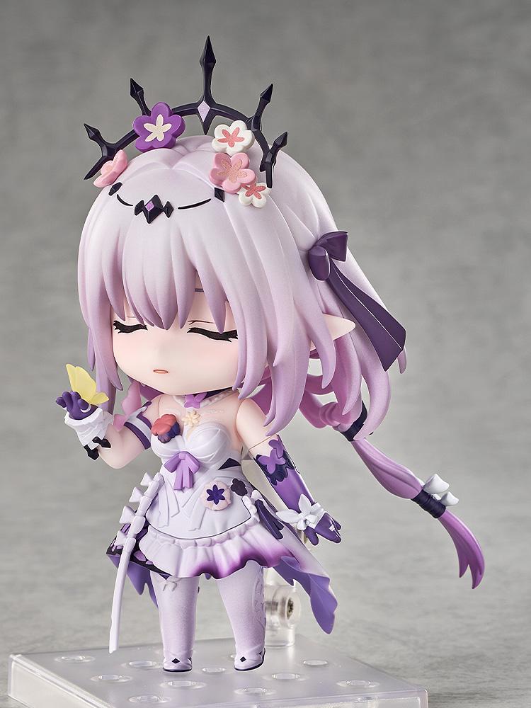 Castorice Nendoroid figure featuring a peaceful, closed-eyes face plate while looking down gently at a small yellow butterfly accessory resting on her gloved hand.