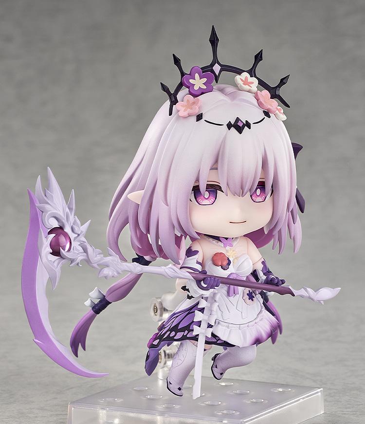 Three-quarter view of the Castorice Nendoroid figure dynamically posed as if floating, holding her purple and white scythe weapon with both hands.