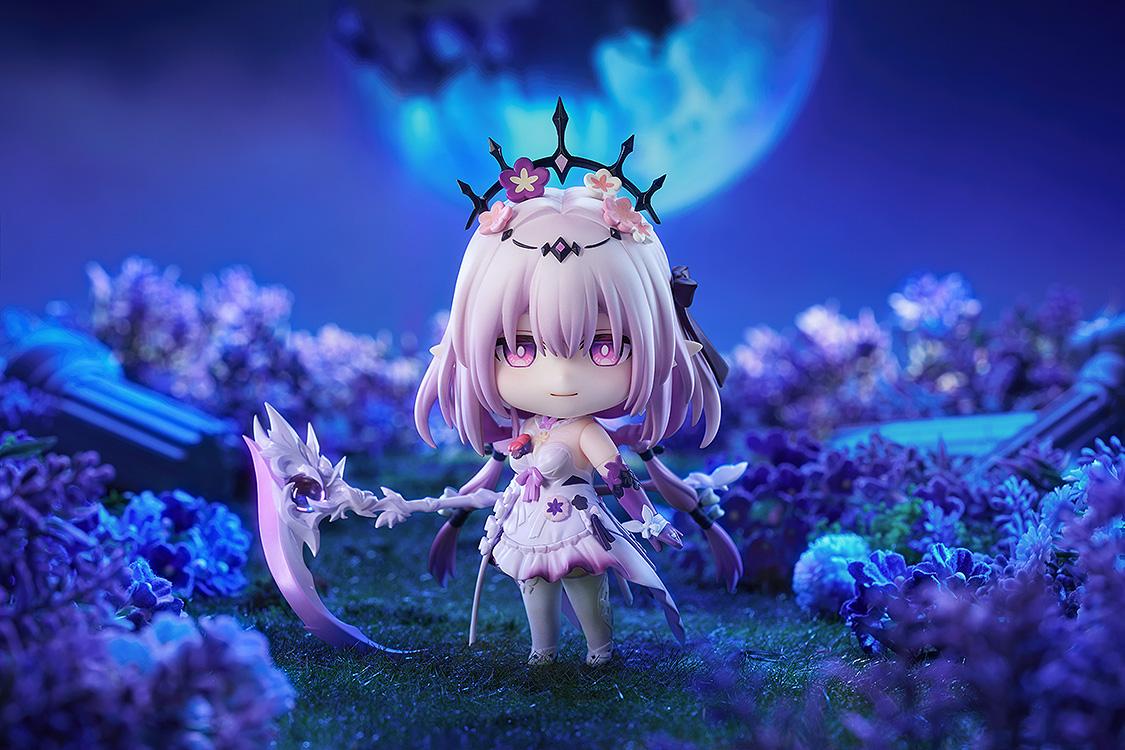 Castorice Nendoroid figure beautifully displayed in a miniature night garden diorama surrounded by purple flowers under a large, glowing blue full moon background.